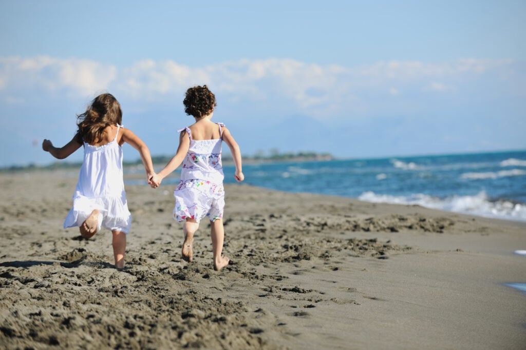 kids playing on beach